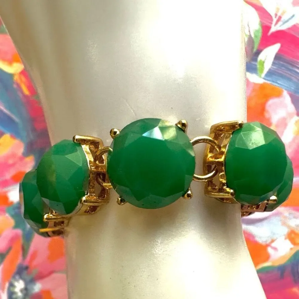 The Limited gold tone and green bracelet
